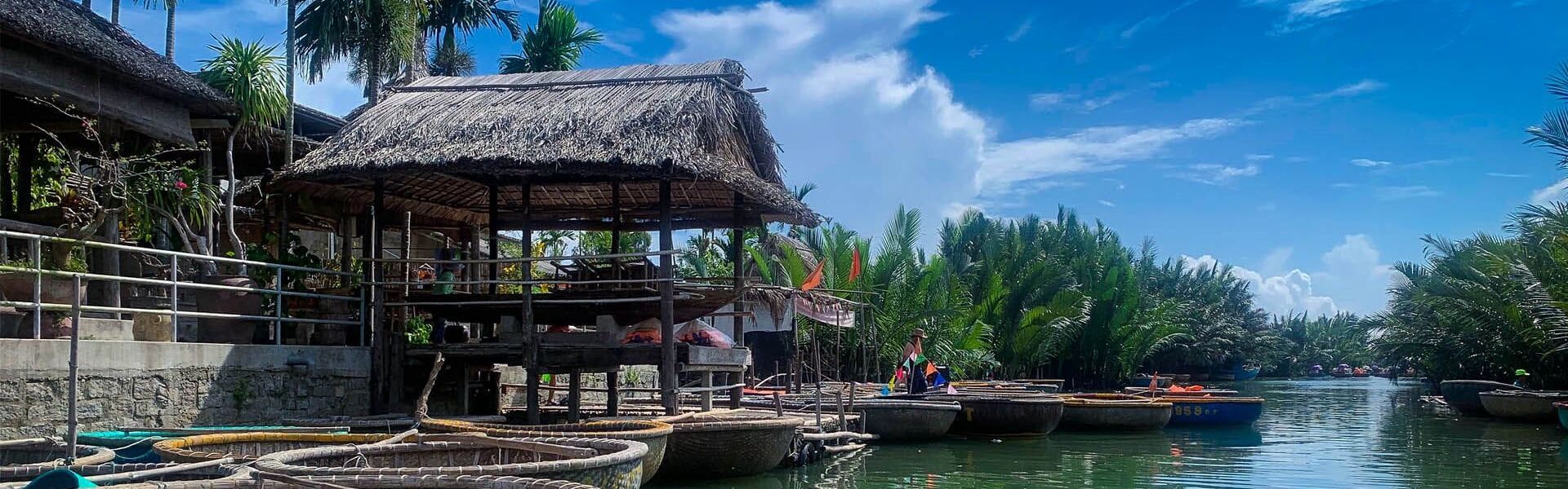 Lush Quang Nam rice fields in Da Nang on a scenic Quang Nam Travel banner by Legend Travel Group.