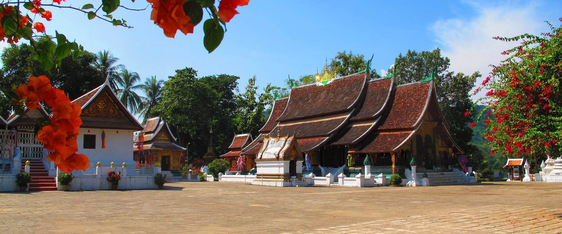 Panoramic view of Laos’ cultural heritage for a scenic Laos Travel banner by Legend Travel Group.