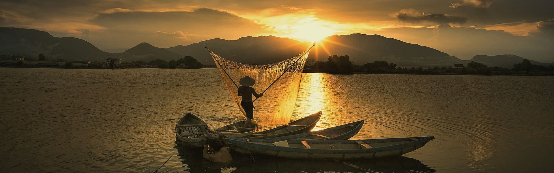 Lush Vietnam Mekong Delta at sunset on a Vietnam Tours banner by Legend Travel Group.