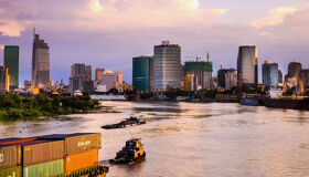 Serene Ho Chi Minh City Saigon River on a Ho Chi Minh City Tours banner by Legend Travel Group.