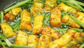 Capture the golden essence of Hanoi’s culinary gem