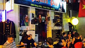 Capture the rum-soaked charm of Hanoi’s nightlife gem