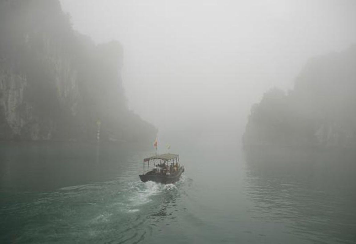 Capture the serene beauty of Halong Bay’s coastal gem