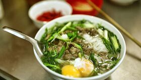 Capture the savory essence of Hanoi’s culinary gem