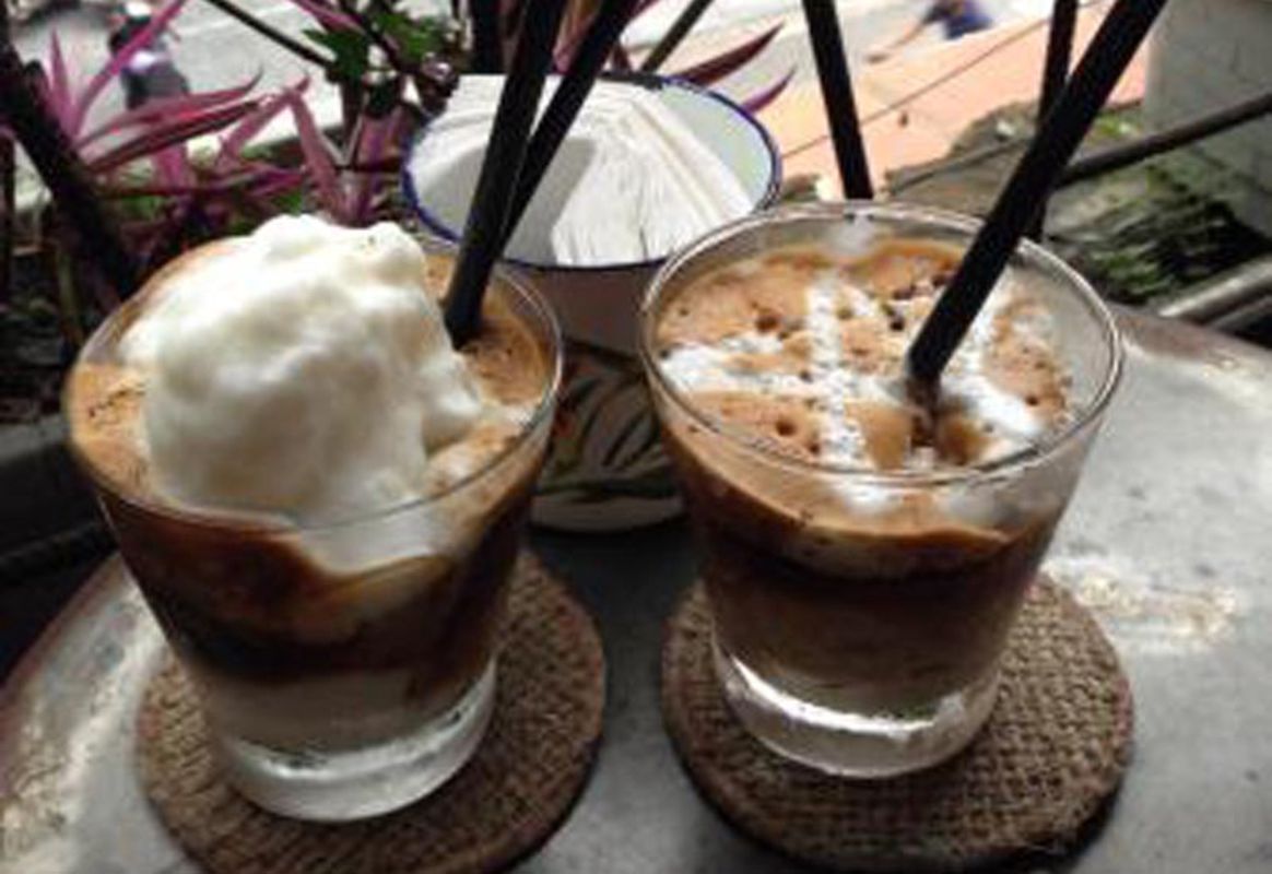 Capture the tropical essence of Hanoi’s coffee gem