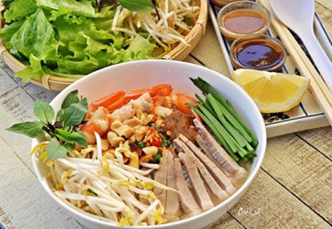 Capture the tangy essence of Bún Gỏi Dà’s culinary charm