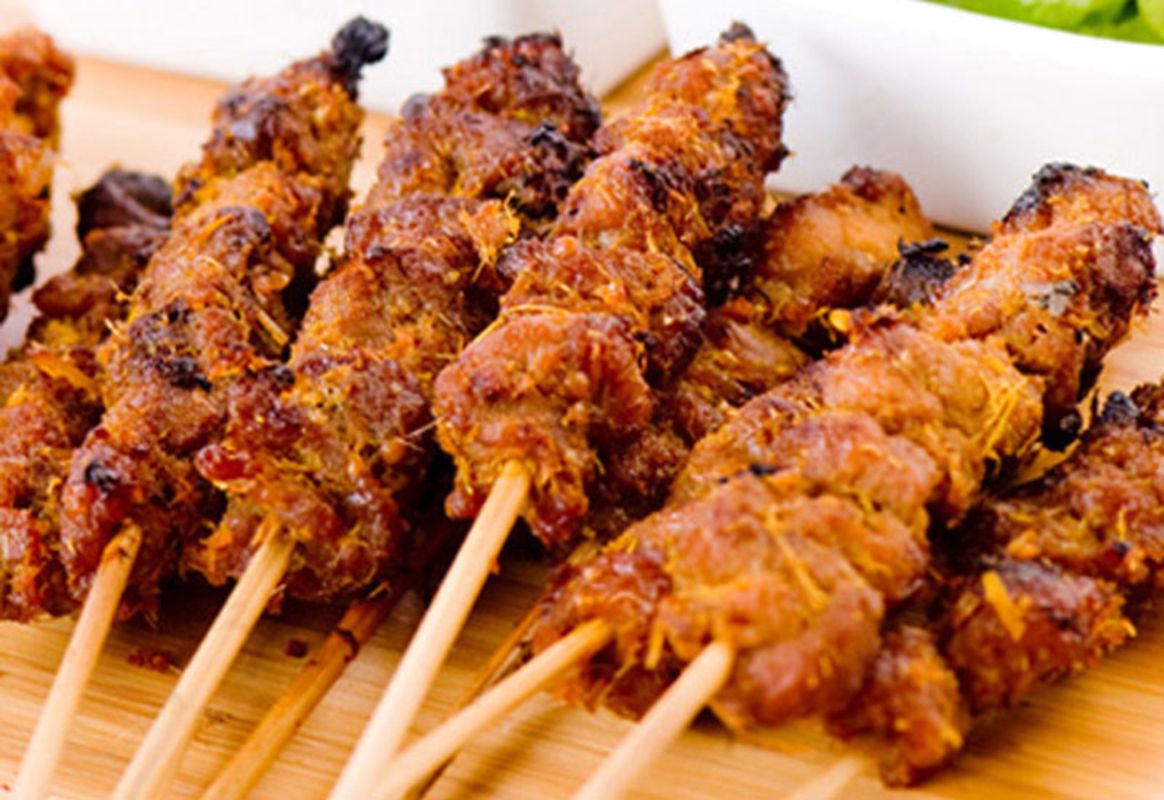 Capture the smoky essence of Hanoi’s street food gem