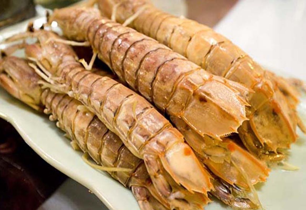 Dive into the flavorful charm of Halong Bay Travel
