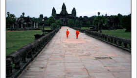 Buddhist Monks walking to the Angkor Wat, Siem Reap, Cambodia