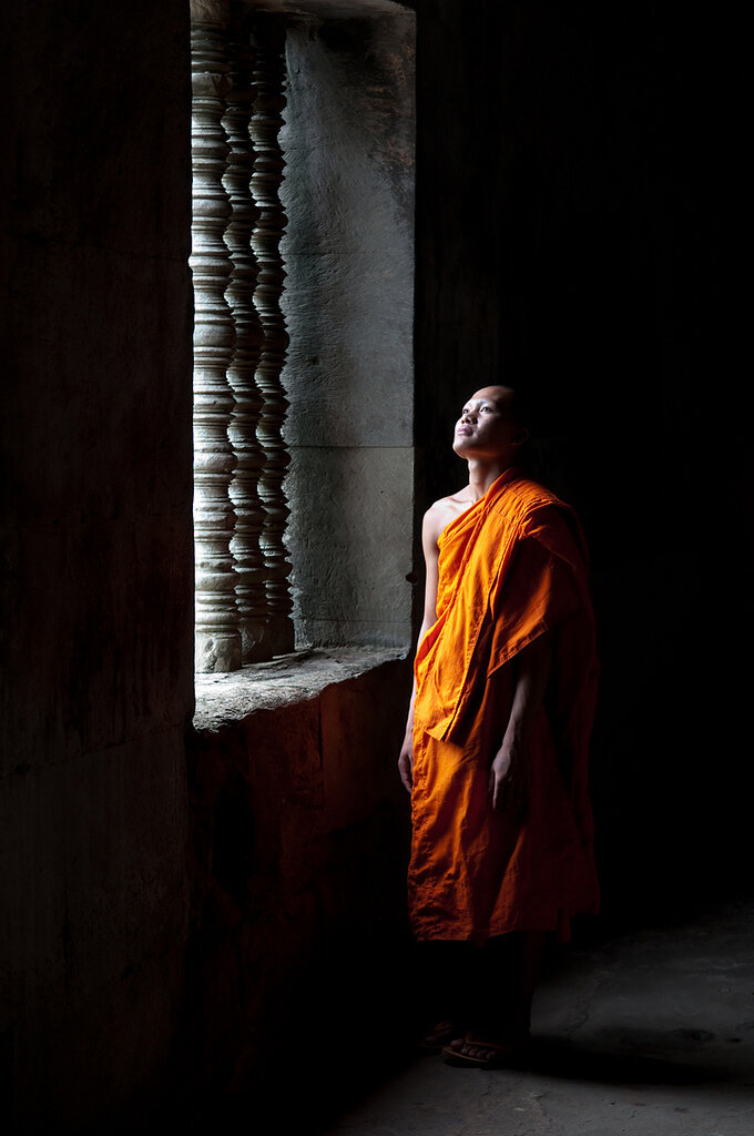 Buddhist Monk inside the Temple  at Angkor Complex, Siem Reap