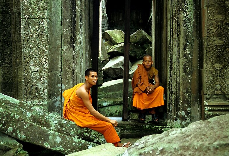 Buddhist Monks sitting at Angkor Temples, Siem Reap
