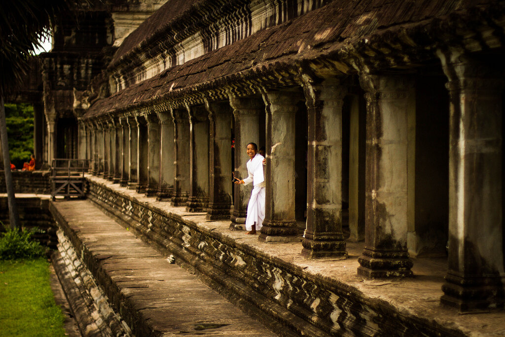 Tourist taking the photo at the Angkor Temples, Siem Reap