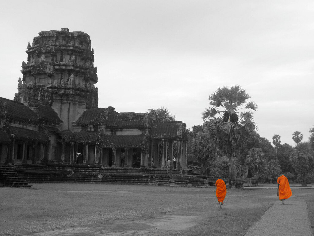Buddhist Monks walking in the front of Angkor Temples, Cambodia