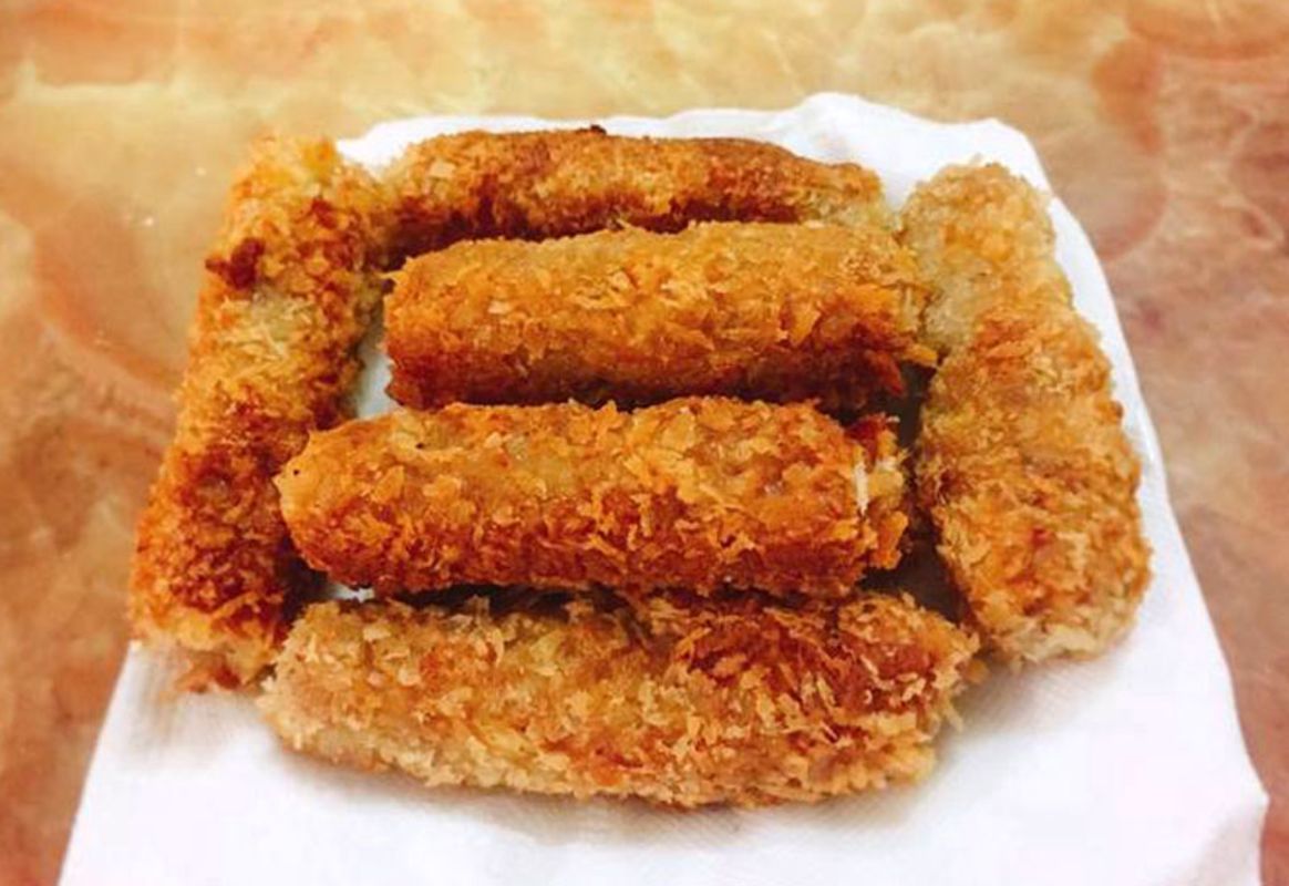 Capture the savory essence of Hanoi’s street food gem