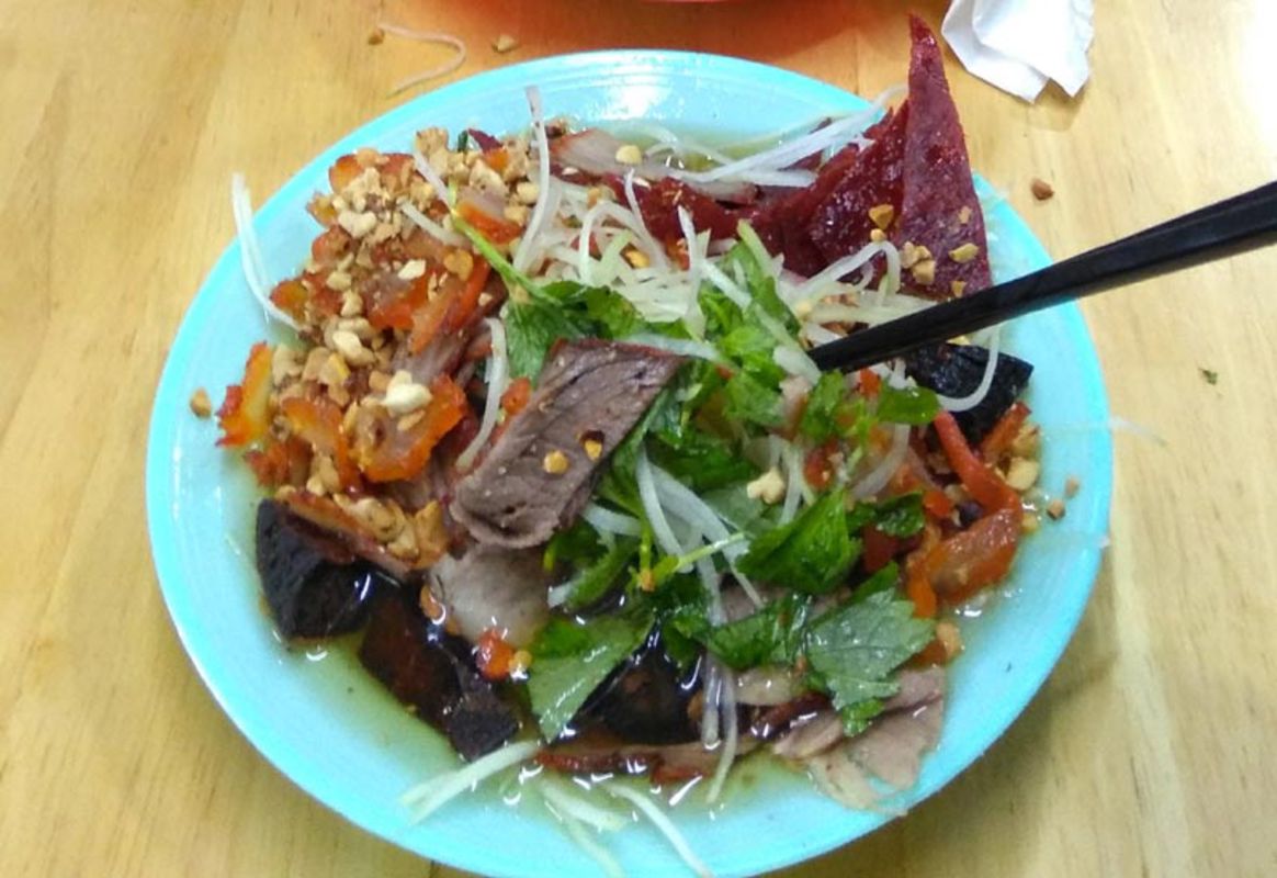 Capture the crisp flavors of Hanoi’s street food gem