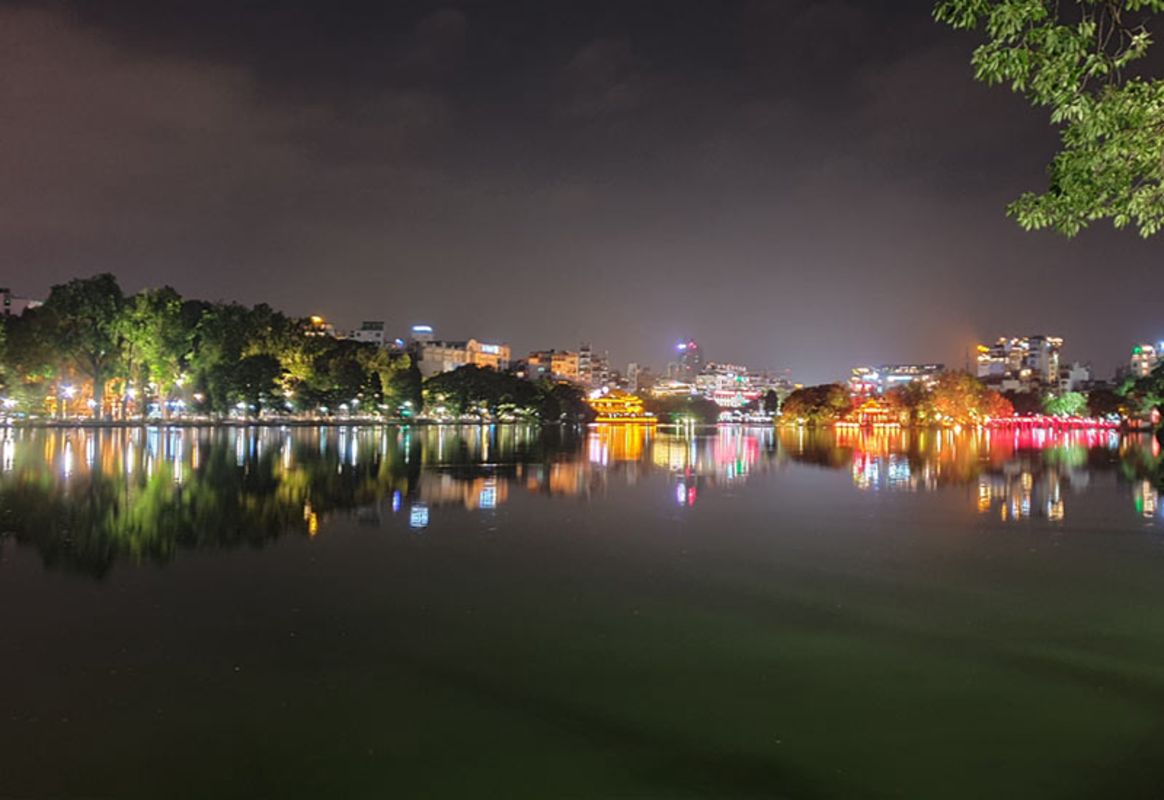 Capture the vibrant energy of Hanoi’s nightlife gem